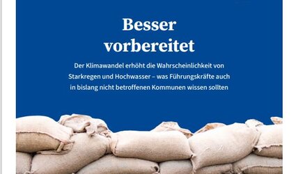 Titelseite der Broschüre zeigt einen Stapel Sandsäcke, die das Eindringen von Wasser verhindern soll.